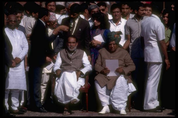 Janata Dal Party dissident ldr. Chandra Shekhar (C-R) & supporters, outside pres. palace, after being asked to form new govt. (Photo by Robert Nickelsberg/Getty Images)